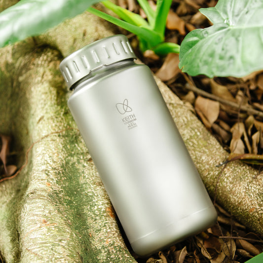 Botellas de agua deportivas grandes de titanio
