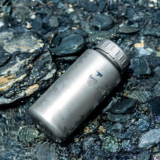 Botellas de agua deportivas grandes de titanio